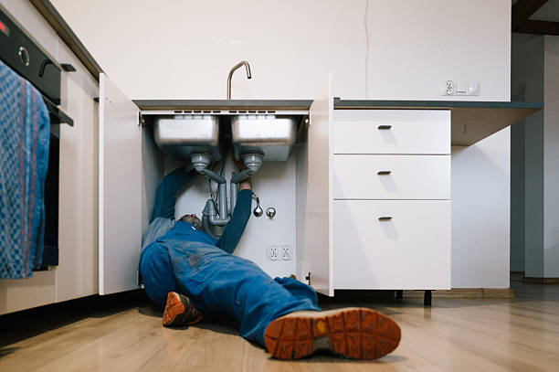 Professional Drain Cleaning technician working in Pana, IL